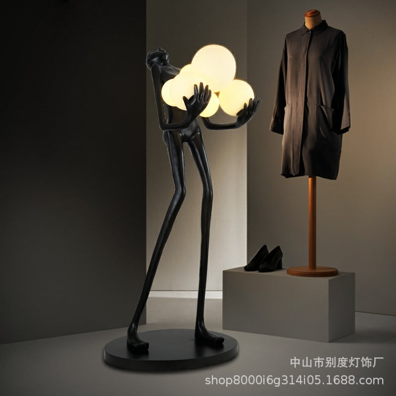 Meet me here: Human Floor Sculpture with Balls